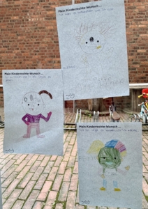Gemalte Bilder mit Wünschen für Kinderrechte